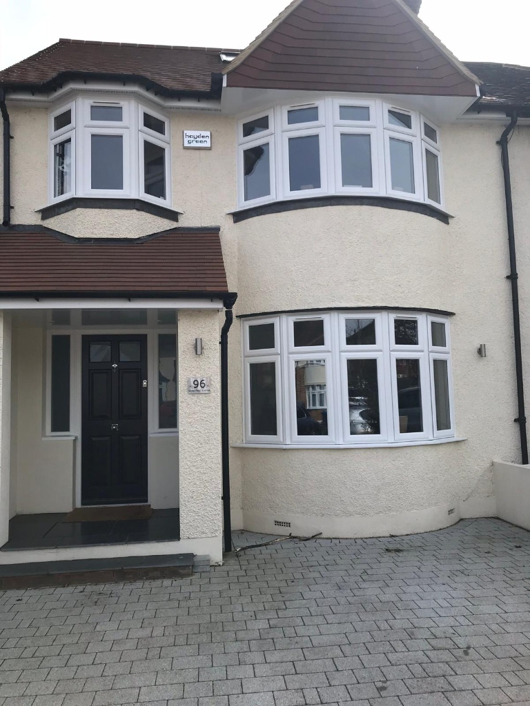 uPVC bay and casement windows on semi-detached house